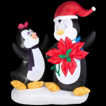 6 ft. H Animated Inflatable Penguin Couple with Poinsettia Flower